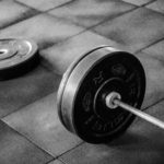 grayscale-photo-of-black-adjustable-dumbbell-949131
